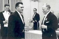Governor General Roland Michener invests hockey great Maurice Richard in the Order of Canada. Date: November 24, 1967. Photographer: National Film Board of Canada. Reference: Library and Archives Canada, PA-211754.